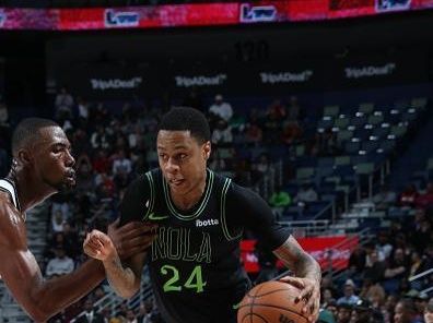 NEW ORLEANS, LA - JANUARY 2: Jordan Hawkins #24 of the New Orleans Pelicans handles the ball during the game against the Brooklyn Nets on January 2, 2024 at the Smoothie King Center in New Orleans, Louisiana. NOTE TO USER: User expressly acknowledges and agrees that, by downloading and or using this Photograph, user is consenting to the terms and conditions of the Getty Images License Agreement. Mandatory Copyright Notice: Copyright 2024 NBAE (Photo by Layne Murdoch Jr./NBAE via Getty Images)