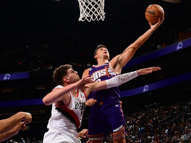 PHOENIX, AZ - NOVEMBER 2: Grayson Allen #8 of the Phoenix Suns drives to the basket during the game against the Portland Trail Blazers on November 2, 2024 at Footprint Center in Phoenix, Arizona. NOTE TO USER: User expressly acknowledges and agrees that, by downloading and or using this photograph, user is consenting to the terms and conditions of the Getty Images License Agreement. Mandatory Copyright Notice: Copyright 2024 NBAE (Photo by Kate Frese/NBAE via Getty Images)