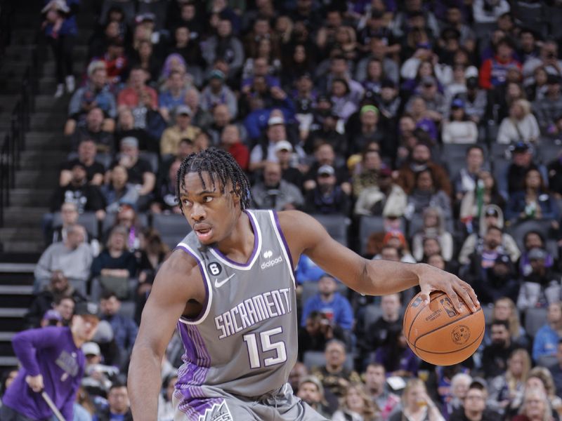 SACRAMENTO, CA - MARCH 9: Davion Mitchell #15 of the Sacramento Kings dribbles the ball during the game against the New York Knicks on March 9, 2023 at Golden 1 Center in Sacramento, California. NOTE TO USER: User expressly acknowledges and agrees that, by downloading and or using this Photograph, user is consenting to the terms and conditions of the Getty Images License Agreement. Mandatory Copyright Notice: Copyright 2023 NBAE (Photo by Rocky Widner/NBAE via Getty Images)