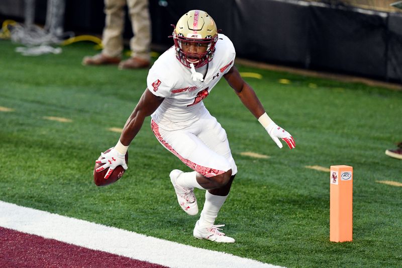 Nov 14, 2020; Chestnut Hill, Massachusetts, USA;  Boston College Eagles wide receiver Zay Flowers (4) celebrates after scoring a touchdown against the Notre Dame Fighting Irish during the first half at Alumni Stadium. Mandatory Credit: Brian Fluharty-USA TODAY Sports