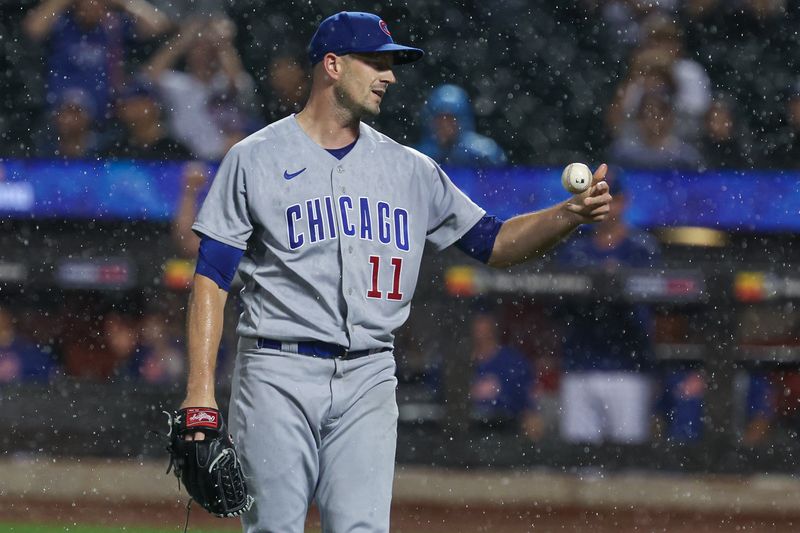 Aug 7, 2023; New York City, New York, USA; Chicago Cubs starting pitcher Drew Smyly (11) reacts after a bunt single by New York Mets center fielder Rafael Ortega (not pictured) during the sixth inning at Citi Field. Mandatory Credit: Vincent Carchietta-USA TODAY Sports