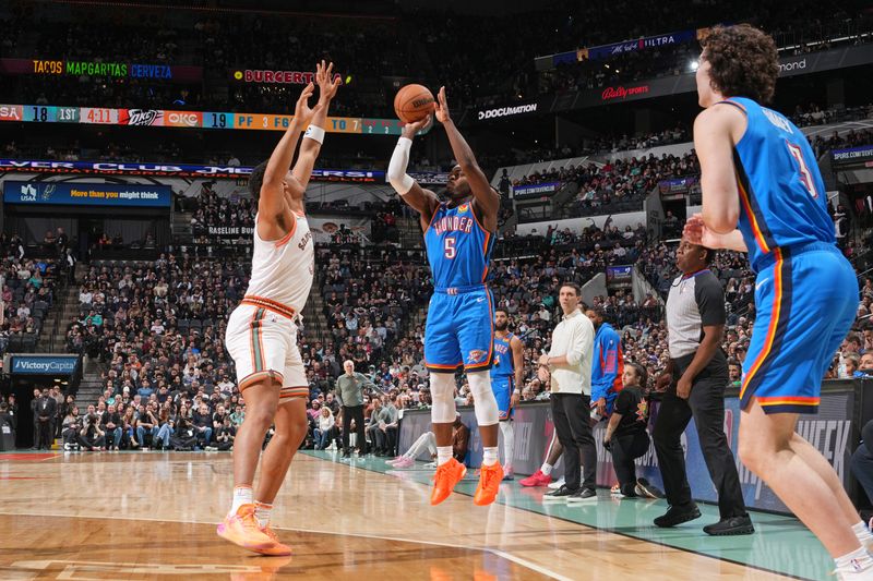 SAN ANTONIO, TX - JANUARY 24: Luguentz Dort #5 of the Oklahoma City Thunder shoots the ball during the game against the San Antonio Spurs on January 24, 2023 at the Frost Bank Center in San Antonio, Texas. NOTE TO USER: User expressly acknowledges and agrees that, by downloading and or using this photograph, user is consenting to the terms and conditions of the Getty Images License Agreement. Mandatory Copyright Notice: Copyright 2024 NBAE (Photos by Jesse D. Garrabrant/NBAE via Getty Images)