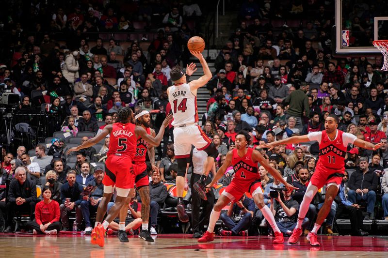 TORONTO, CANADA - JANUARY 17: Tyler Herro #14 of the Miami Heat shoots the ball during the game against the Toronto Raptors on January 17, 2024 at the Scotiabank Arena in Toronto, Ontario, Canada.  NOTE TO USER: User expressly acknowledges and agrees that, by downloading and or using this Photograph, user is consenting to the terms and conditions of the Getty Images License Agreement.  Mandatory Copyright Notice: Copyright 2024 NBAE (Photo by Mark Blinch/NBAE via Getty Images)