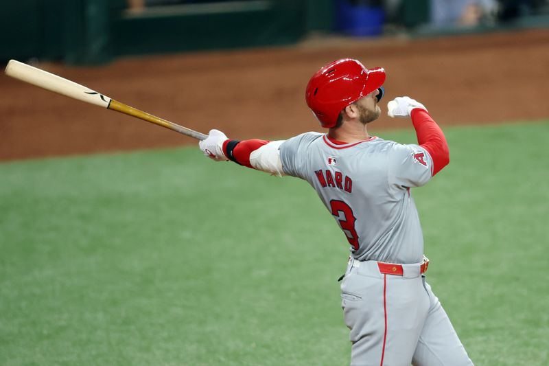 May 17, 2024; Arlington, Texas, USA;  Los Angeles Angels left fielder Taylor Ward (3) hits a home run in the sixth inning against the Texas Rangers at Globe Life Field. Mandatory Credit: Tim Heitman-USA TODAY Sports