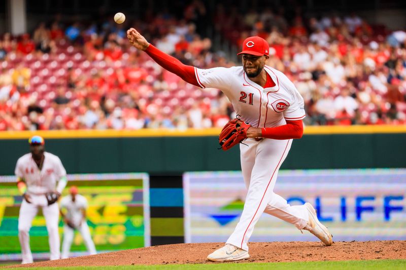 Sep 22, 2024; Cincinnati, Ohio, USA; Cincinnati Reds starting pitcher Hunter Greene (21) pitches against the Pittsburgh Pirates in the second inning at Great American Ball Park. Mandatory Credit: Katie Stratman-Imagn Images