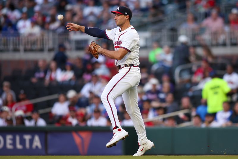May 12, 2025; Atlanta, Georgia, USA; Atlanta Braves first baseman Matt Olson (28) turns a double play against the Washington Nationals in the third inning at Truist Park. Mandatory Credit: Brett Davis-Imagn Images
