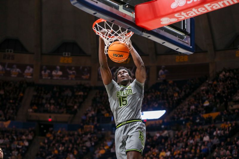 Feb 17, 2024; Morgantown, West Virginia, USA; Baylor Bears forward Josh Ojianwuna (15) dunks the ball during the first half against the West Virginia Mountaineers at WVU Coliseum. Mandatory Credit: Ben Queen-USA TODAY Sports