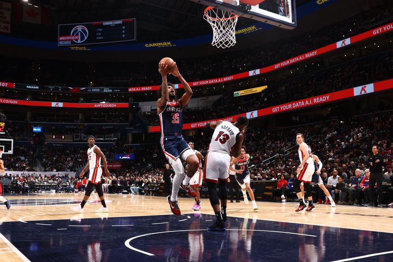 WASHINGTON, DC -? MARCH 31: Marvin Bagley III #35 of the Washington Wizards drives to the basket during the game against the Miami Heat on March 31, 2024 at Capital One Arena in Washington, DC. NOTE TO USER: User expressly acknowledges and agrees that, by downloading and or using this Photograph, user is consenting to the terms and conditions of the Getty Images License Agreement. Mandatory Copyright Notice: Copyright 2024 NBAE (Photo by Kenny Giarla/NBAE via Getty Images)<p><br/></p>