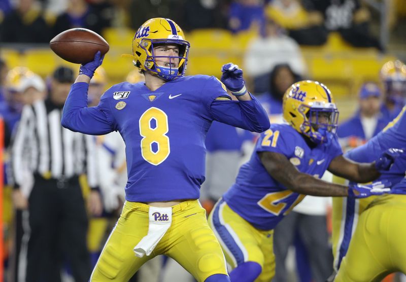 Nov 14, 2019; Pittsburgh, PA, USA; Pittsburgh Panthers quarterback Kenny Pickett (8) passes the ball against the North Carolina Tar Heels during the first quarter at Heinz Field. Mandatory Credit: Charles LeClaire-USA TODAY Sports