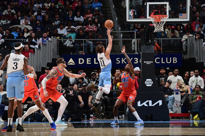 ATLANTA, GA - FEBRUARY 28: Trae Young #11 of the Atlanta Hawks shoots the ball during the game against the Oklahoma City Thunder on February 28, 2025 at State Farm Arena in Atlanta, Georgia.  NOTE TO USER: User expressly acknowledges and agrees that, by downloading and/or using this Photograph, user is consenting to the terms and conditions of the Getty Images License Agreement. Mandatory Copyright Notice: Copyright 2025 NBAE (Photo by Scott Cunningham/NBAE via Getty Images)