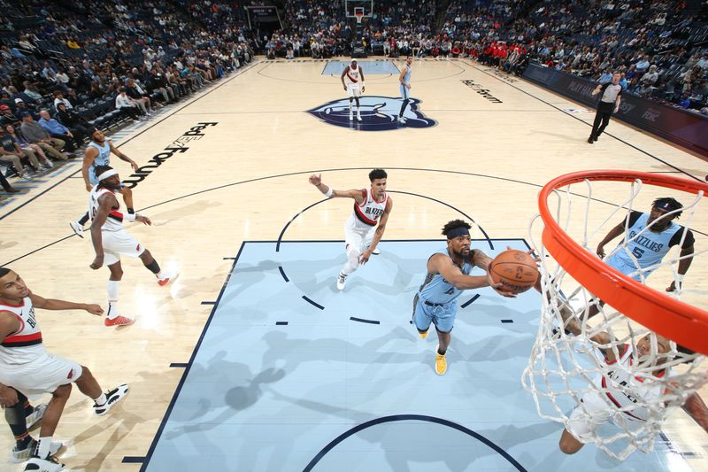 MEMPHIS, TN - MARCH 2:  Jordan Goodwin #4 of the Memphis Grizzlies shoots the ball during the game against the Portland Trail Blazers on March 2, 2024 at FedExForum in Memphis, Tennessee. NOTE TO USER: User expressly acknowledges and agrees that, by downloading and or using this photograph, User is consenting to the terms and conditions of the Getty Images License Agreement. Mandatory Copyright Notice: Copyright 2024 NBAE (Photo by Joe Murphy/NBAE via Getty Images)