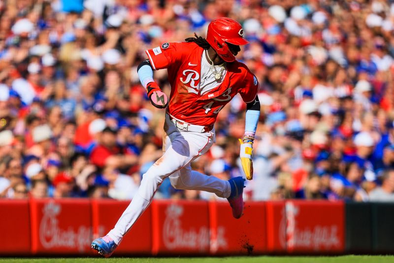 May 24, 2025; Cincinnati, Ohio, USA; Cincinnati Reds shortstop Elly De La Cruz (44) scores on a single hit by first baseman Spencer Steer (not pictured) in the fifth inning against the Chicago Cubs at Great American Ball Park. Mandatory Credit: Katie Stratman-Imagn Images