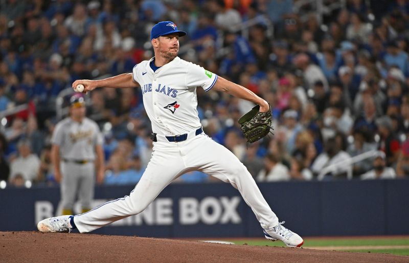 Aug 11, 2024; Toronto, Ontario, CAN; Toronto Blue Jays pitcher Chris Bassitt (40) pitches in the first inning against the Oakland Athletics at Rogers Centre. Mandatory Credit: Gerry Angus-USA TODAY Sports