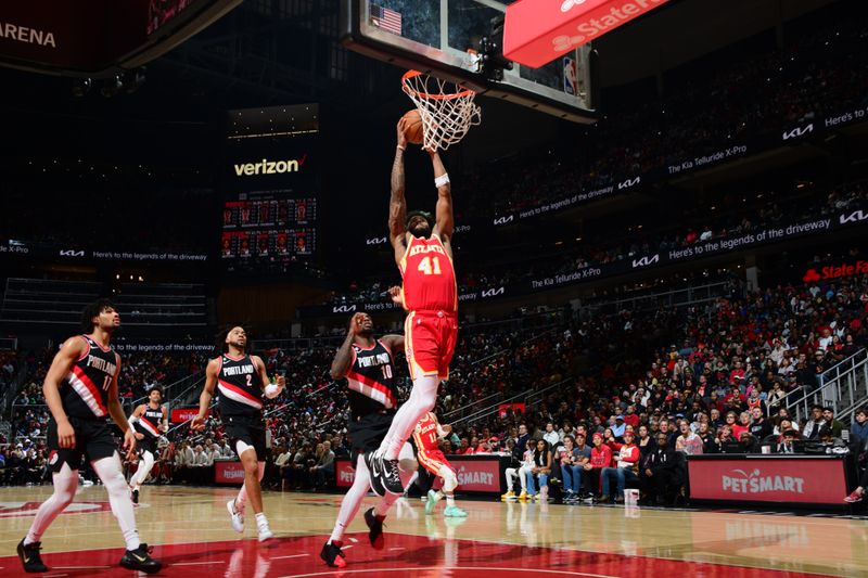 ATLANTA, GA - MARCH 3: Saddiq Bey #41 of the Atlanta Hawks drives to the basket during the game against the Portland Trail Blazers on March 3, 2023 at State Farm Arena in Atlanta, Georgia.  NOTE TO USER: User expressly acknowledges and agrees that, by downloading and/or using this Photograph, user is consenting to the terms and conditions of the Getty Images License Agreement. Mandatory Copyright Notice: Copyright 2023 NBAE (Photo by Scott Cunningham/NBAE via Getty Images)