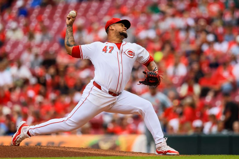 May 29, 2024; Cincinnati, Ohio, USA; Cincinnati Reds starting pitcher Frankie Montas (47) pitches against the St. Louis Cardinals in the first inning at Great American Ball Park. Mandatory Credit: Katie Stratman-USA TODAY Sports