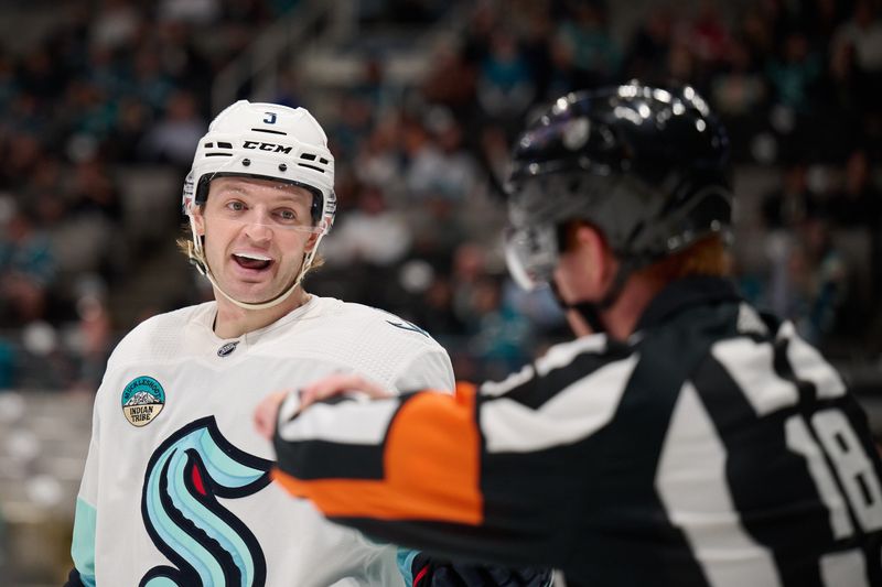 Jan 30, 2024; San Jose, California, USA; Seattle Kraken defenseman Will Borgen (3) reacts to a penalty call by referee Tom Chmielewski (18) during the second period against the San Jose Sharks at SAP Center at San Jose. Mandatory Credit: Robert Edwards-USA TODAY Sports