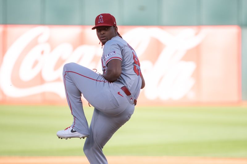 Jul 2, 2024; Oakland, California, USA; Los Angeles Angels pitcher José Soriano (59) pitches against the Oakland Athletics during the first inning at Oakland-Alameda County Coliseum. Mandatory Credit: Ed Szczepanski-USA TODAY Sports