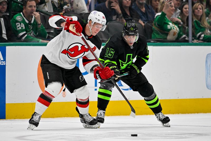 Mar 14, 2024; Dallas, Texas, USA; New Jersey Devils left wing Ondrej Palat (18) and Dallas Stars center Craig Smith (15) battle for control of the puck during the second period at the American Airlines Center. Mandatory Credit: Jerome Miron-USA TODAY Sports