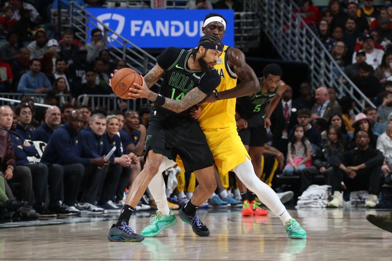 NEW ORLEANS, LA - MARCH 1:  Brandon Ingram #14 of the New Orleans Pelicans handles the ball during the game against the Indiana Pacers on March 1, 2024 at the Smoothie King Center in New Orleans, Louisiana. NOTE TO USER: User expressly acknowledges and agrees that, by downloading and or using this Photograph, user is consenting to the terms and conditions of the Getty Images License Agreement. Mandatory Copyright Notice: Copyright 2024 NBAE (Photo by Layne Murdoch Jr./NBAE via Getty Images)