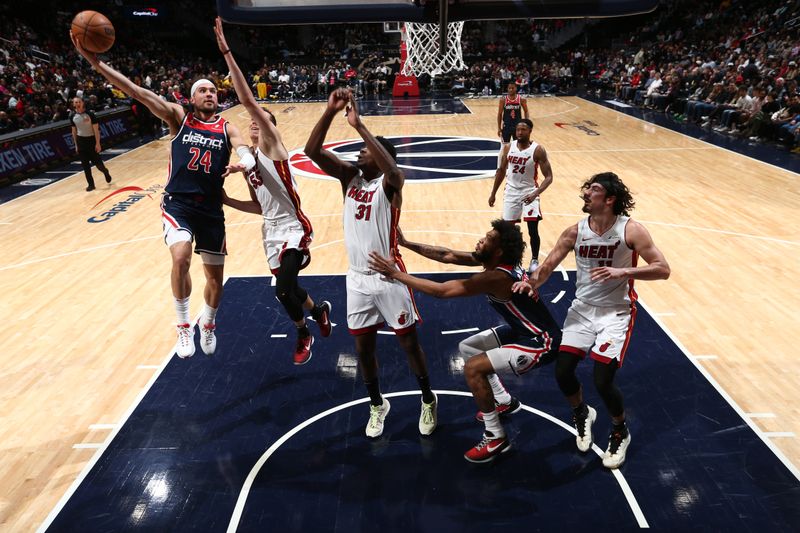 WASHINGTON, DC -? MARCH 31: Corey Kispert #24 of the Washington Wizards drives to the basket during the game against the Miami Heat on March 31, 2024 at Capital One Arena in Washington, DC. NOTE TO USER: User expressly acknowledges and agrees that, by downloading and or using this Photograph, user is consenting to the terms and conditions of the Getty Images License Agreement. Mandatory Copyright Notice: Copyright 2024 NBAE (Photo by Kenny Giarla/NBAE via Getty Images)