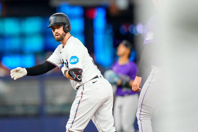 Jul 23, 2023; Miami, Florida, USA; Miami Marlins shortstop Jon Berti (5) celebrates hitting a double against the Colorado Rockies during the second inning at loanDepot Park. Mandatory Credit: Rich Storry-USA TODAY Sports