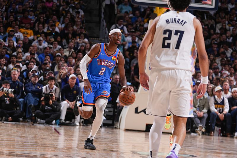 DENVER, CO - MAY 15: Shai Gilgeous-Alexander #2 of the Oklahoma City Thunder handles the ball during the game against the Denver Nuggets during Round 2 Game 6 on May 15, 2025 at Ball Arena in Denver, Colorado. NOTE TO USER: User expressly acknowledges and agrees that, by downloading and/or using this Photograph, user is consenting to the terms and conditions of the Getty Images License Agreement. Mandatory Copyright Notice: Copyright 2025 NBAE (Photo by Bart Young/NBAE via Getty Images)