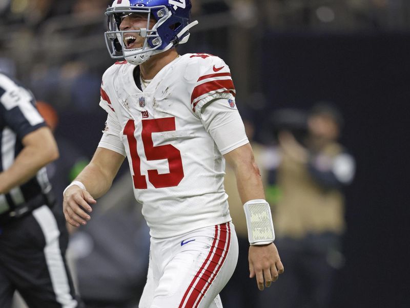 New York Giants quarterback Tommy DeVito (15) reacts after a play during an NFL football game against the New Orleans Saints, Sunday, Dec. 17, 2023, in New Orleans. (AP Photo/Tyler Kaufman)