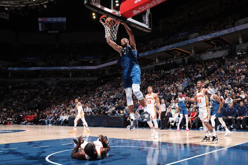 MINNEAPOLIS, MN -  APRIL 12:  Rudy Gobert #27 of the Minnesota Timberwolves dunks the ball during the game against the Atlanta Hawks on April 12, 2024 at Target Center in Minneapolis, Minnesota. NOTE TO USER: User expressly acknowledges and agrees that, by downloading and or using this Photograph, user is consenting to the terms and conditions of the Getty Images License Agreement. Mandatory Copyright Notice: Copyright 2024 NBAE (Photo by David Sherman/NBAE via Getty Images)