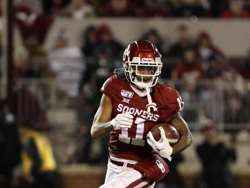 Nov 23, 2019; Norman, OK, USA; Oklahoma Sooners wide receiver Jadon Haselwood (11) runs during the game against the TCU Horned Frogs at Gaylord Family - Oklahoma Memorial Stadium. Mandatory Credit: Kevin Jairaj-USA TODAY Sports