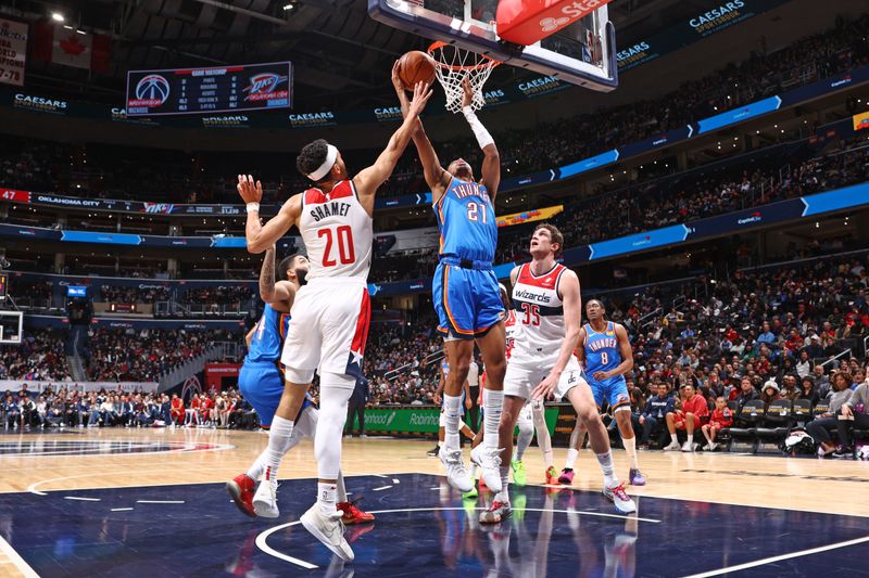 WASHINGTON, DC -? JANUARY 8: Aaron Wiggins #21 of the Oklahoma City Thunder drives to the basket during the game against the Washington Wizards on January 8, 2024 at Capital One Arena in Washington, DC. NOTE TO USER: User expressly acknowledges and agrees that, by downloading and or using this Photograph, user is consenting to the terms and conditions of the Getty Images License Agreement. Mandatory Copyright Notice: Copyright 2024 NBAE (Photo by Kenny Giarla/NBAE via Getty Images)