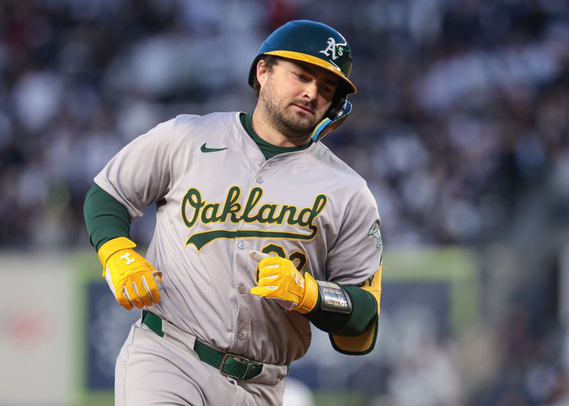 Apr 23, 2024; Bronx, New York, USA; Oakland Athletics catcher Shea Langeliers (23) runs the bases after hitting a solo home run during the second inning against the New York Yankees at Yankee Stadium. Mandatory Credit: Vincent Carchietta-USA TODAY Sports