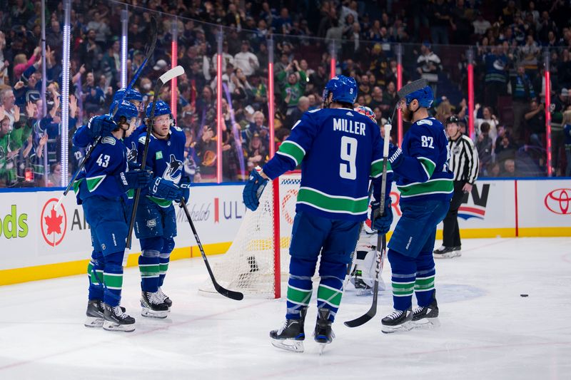 Mar 16, 2024; Vancouver, British Columbia, CAN; Vancouver Canucks defenseman Quinn Hughes (43) and forward Ilya Mikheyev (65) and forward Brock Boeser (6) and forward J.T. Miller (9) and defenseman Ian Cole (82) celebrate Boeser’s goal scored on Washington Capitals goalie Charlie Lindgren (79) in the first period at Rogers Arena. Mandatory Credit: Bob Frid-USA TODAY Sports