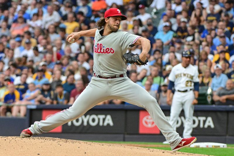 Sep 2, 2023; Milwaukee, Wisconsin, USA; Philadelphia Phillies pitcher Aaron Nola (27) pitches in the first inning against the Milwaukee Brewers at American Family Field. Mandatory Credit: Benny Sieu-USA TODAY Sports