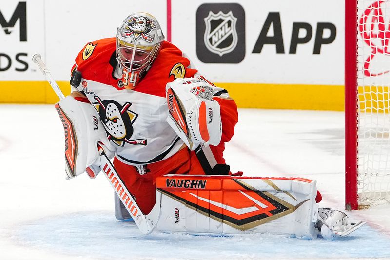Nov 8, 2025; Las Vegas, Nevada, USA; Anaheim Ducks goaltender Petr Mrazek (34) makes a save against the Vegas Golden Knights during the second period at T-Mobile Arena. Mandatory Credit: Stephen R. Sylvanie-Imagn Images