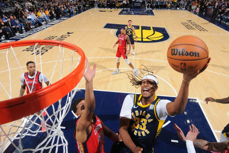 INDIANAPOLIS, IN - NOVEMBER 25: Myles Turner #33 of the Indiana Pacers drives to the basket during the game against the New Orleans Pelicans on November 25, 2024 at Gainbridge Fieldhouse in Indianapolis, Indiana. NOTE TO USER: User expressly acknowledges and agrees that, by downloading and or using this Photograph, user is consenting to the terms and conditions of the Getty Images License Agreement. Mandatory Copyright Notice: Copyright 2024 NBAE (Photo by Ron Hoskins/NBAE via Getty Images)