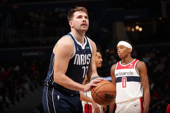 WASHINGTON, DC -? NOVEMBER 15: Luka Doncic #77 of the Dallas Mavericks shoots a free throw during the game against the Washington Wizards on November 15, 2023 at Capital One Arena in Washington, DC. NOTE TO USER: User expressly acknowledges and agrees that, by downloading and or using this Photograph, user is consenting to the terms and conditions of the Getty Images License Agreement. Mandatory Copyright Notice: Copyright 2023 NBAE (Photo by KeShawn Ennis/NBAE via Getty Images)