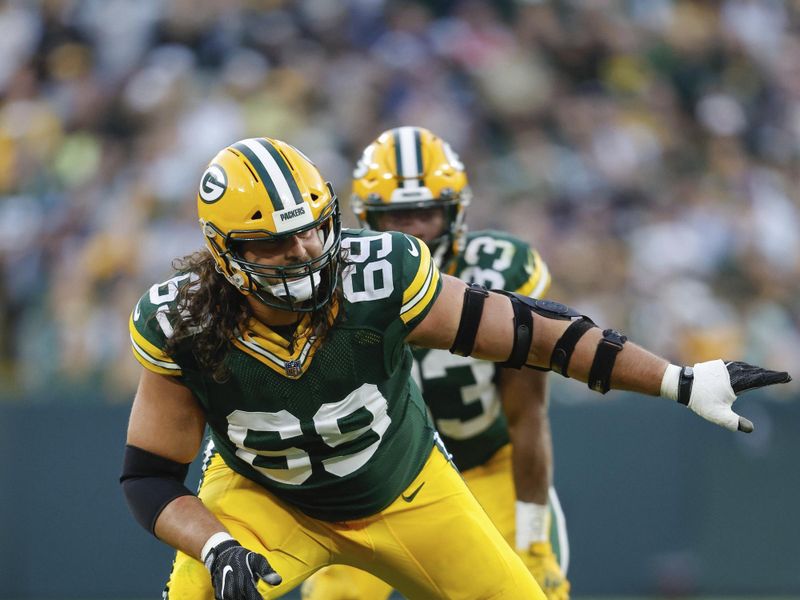 Green Bay Packers offensive tackle David Bakhtiari (69) blocks during an NFL game against the New England Patriots Sunday, Oct. 2, 2022, in Green Bay, Wis. (AP Photo/Jeffrey Phelps)