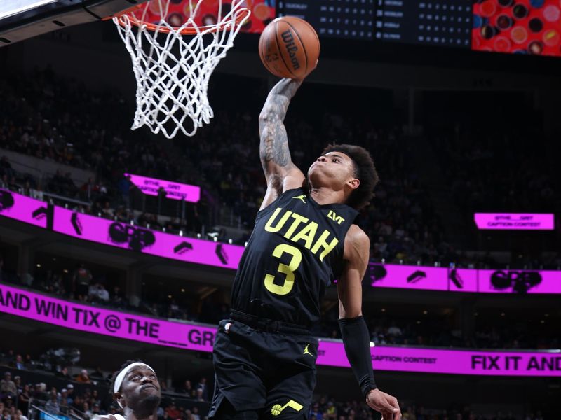 SALT LAKE CITY, UT - JANUARY 12: Keyonte George #3 of the Utah Jazz dunks the ball during the game against the Toronto Raptors on January 12, 2024 at Delta Center in Salt Lake City, Utah. NOTE TO USER: User expressly acknowledges and agrees that, by downloading and or using this Photograph, User is consenting to the terms and conditions of the Getty Images License Agreement. Mandatory Copyright Notice: Copyright 2024 NBAE (Photo by Melissa Majchrzak/NBAE via Getty Images)