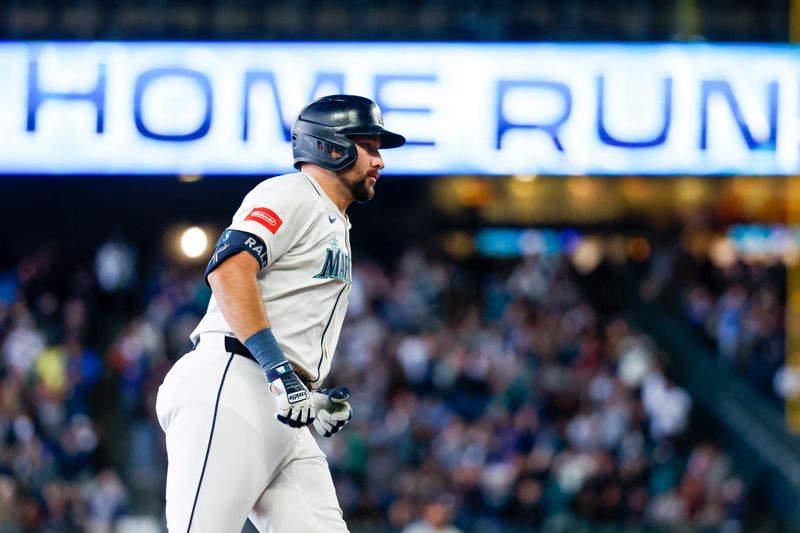 May 31, 2025; Seattle, Washington, USA; Seattle Mariners designated hitter Cal Raleigh (29) runs the bases after hitting a two-run home run against the Minnesota Twins during the third inning at T-Mobile Park. Mandatory Credit: Joe Nicholson-Imagn Images