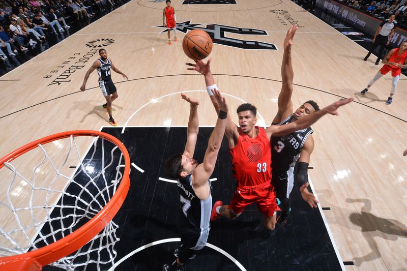 SAN ANTONIO, TX - JANUARY 26: Toumani Camara #33 of the Portland Trail Blazers drives to the basket during the game against the San Antonio Spurs on January 26, 2024 at the Frost Bank Center in San Antonio, Texas. NOTE TO USER: User expressly acknowledges and agrees that, by downloading and or using this photograph, user is consenting to the terms and conditions of the Getty Images License Agreement. Mandatory Copyright Notice: Copyright 2024 NBAE (Photos by Michael Gonzales/NBAE via Getty Images)