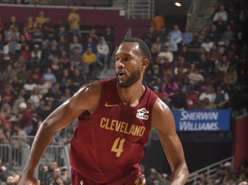 CLEVELAND, OH - JANUARY 5: Evan Mobley #4 of the Cleveland Cavaliers handles the ball during the game against the Charlotte Hornets on January 5, 2025 at Rocket Mortgage FieldHouse in Cleveland, Ohio. NOTE TO USER: User expressly acknowledges and agrees that, by downloading and/or using this Photograph, user is consenting to the terms and conditions of the Getty Images License Agreement. Mandatory Copyright Notice: Copyright 2025 NBAE (Photo by David Liam Kyle/NBAE via Getty Images)