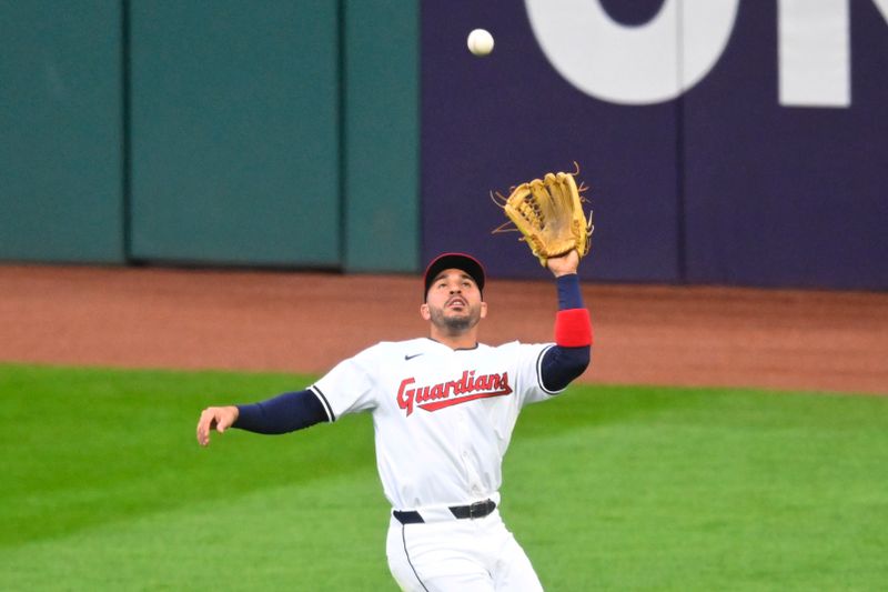 Apr 10, 2024; Cleveland, Ohio, USA; Cleveland Guardians outfielder Ramón Laureano (10) makes a catch in the third inning against the Chicago White Sox at Progressive Field. Mandatory Credit: David Richard-USA TODAY Sports