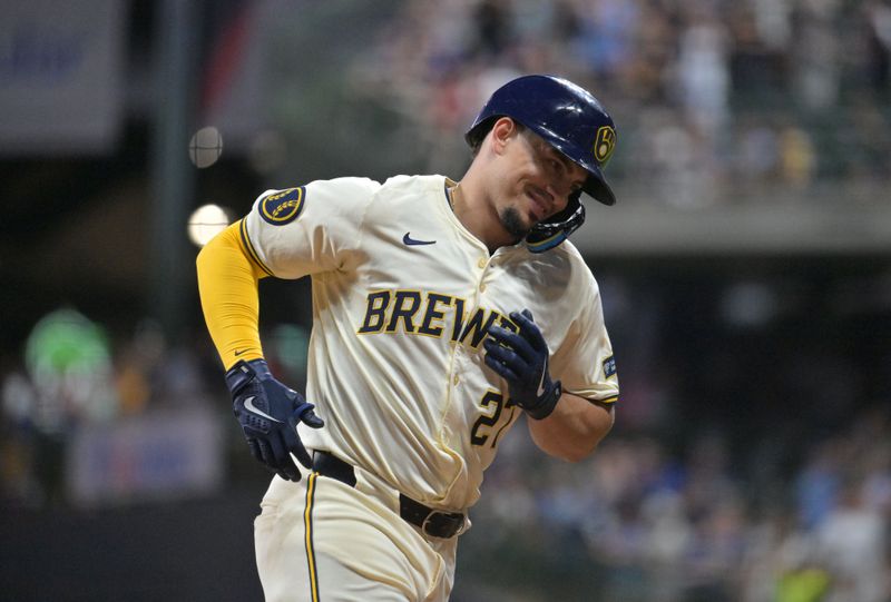 Jul 29, 2024; Milwaukee, Wisconsin, USA; Milwaukee Brewers shortstop Willy Adames (27) rounds the bases after hitting a home run against the Atlanta Braves in the sixth inning at American Family Field. Mandatory Credit: Michael McLoone-USA TODAY Sports