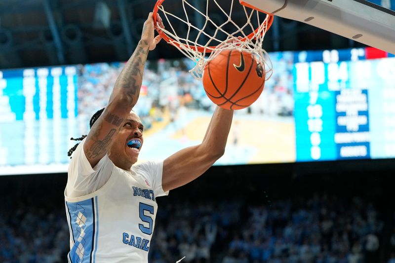 Feb 3, 2024; Chapel Hill, North Carolina, USA;  North Carolina Tar Heels forward Armando Bacot (5) scores in the second half at Dean E. Smith Center. Mandatory Credit: Bob Donnan-USA TODAY Sports