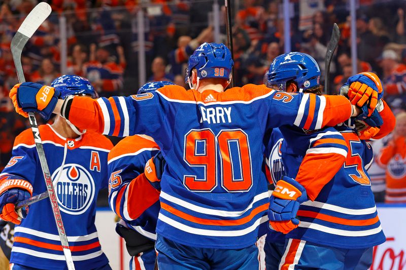 Apr 10, 2024; Edmonton, Alberta, CAN; The Edmonton Oilers celebrate a goal scored by defensemen Cody Ceci (5) during the first period against the Vegas Golden Knights at Rogers Place. Mandatory Credit: Perry Nelson-USA TODAY Sports