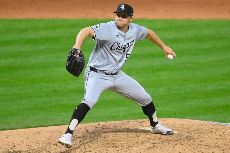 Apr 10, 2024; Cleveland, Ohio, USA; Chicago White Sox pitcher Tanner Banks (57) delivers a pitch in the sixth inning against the Cleveland Guardians at Progressive Field. Mandatory Credit: David Richard-USA TODAY Sports