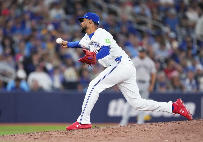 Jun 30, 2024; Toronto, Ontario, CAN; Toronto Blue Jays relief pitcher Jose Cuas (74) throws pitch against the New York Yankees during the seventh inning at Rogers Centre. Mandatory Credit: Nick Turchiaro-USA TODAY Sports