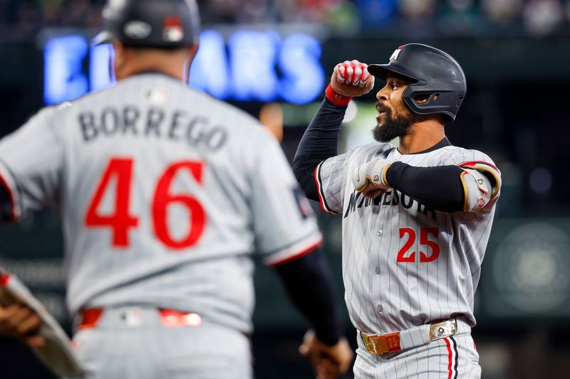 May 31, 2025; Seattle, Washington, USA; Minnesota Twins center fielder Byron Buxton (25) reacts towards the Twins dugout after hitting an RBI-single against the Seattle Mariners during the second inning at T-Mobile Park. Mandatory Credit: Joe Nicholson-Imagn Images