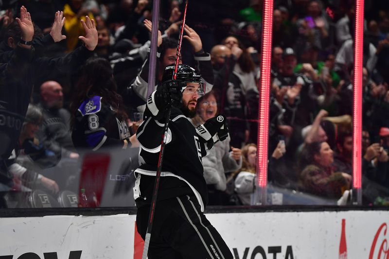 Mar 16, 2023; Los Angeles, California, USA; Los Angeles Kings defenseman Drew Doughty (8) celebrates his goal scored against the Columbus Blue Jackets during the second period at Crypto.com Arena. Mandatory Credit: Gary A. Vasquez-USA TODAY Sports