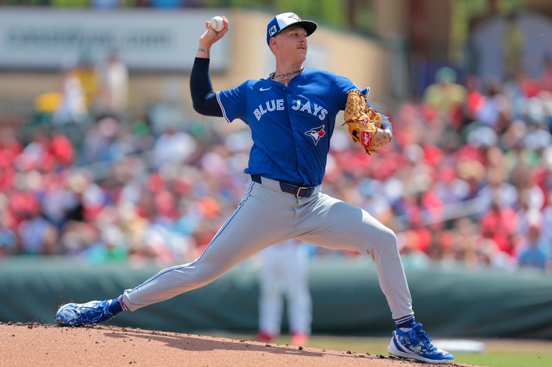 Mar 15, 2025; Jupiter, Florida, USA; Toronto Blue Jays starting pitcher Bowden Francis (44) delivers a pitch against the St. Louis Cardinals during the first inning at Roger Dean Chevrolet Stadium. Mandatory Credit: Sam Navarro-Imagn Images